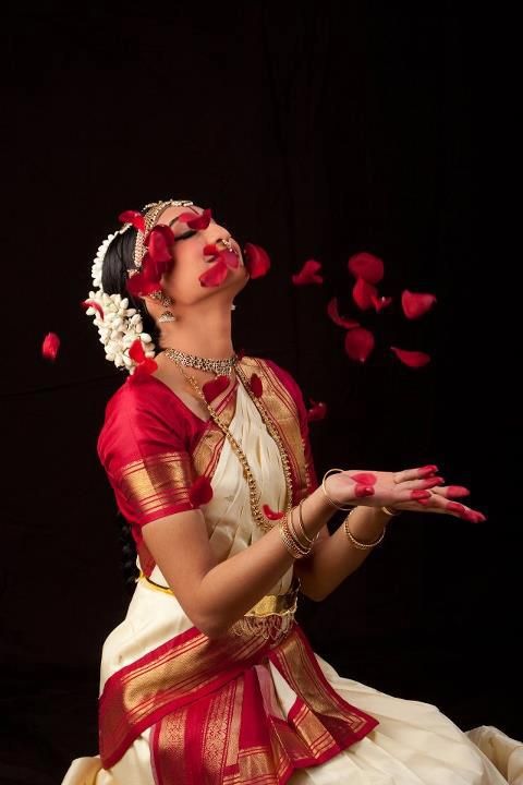 Young beautiful woman dancer exponent of Indian classical dance  Bharatanatyam in Krishna pose Stock Photo - Alamy